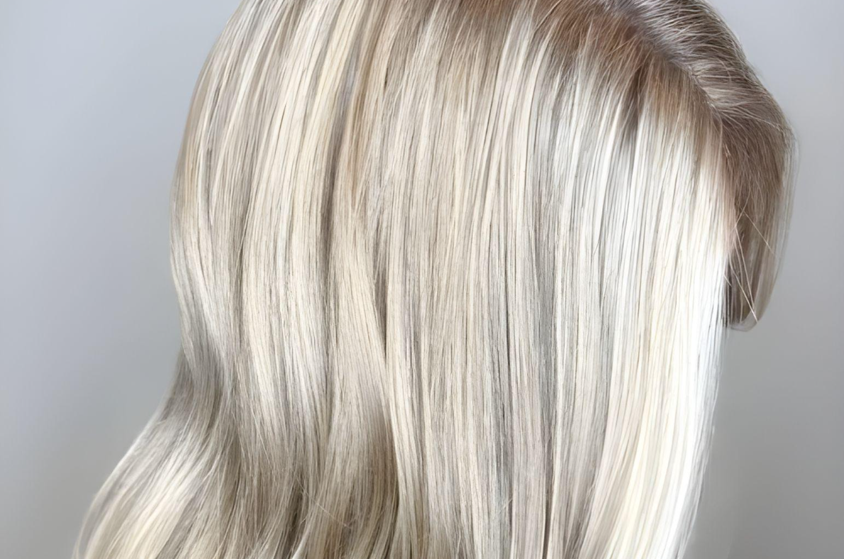 Full babylights hair color with natural blonde highlights at Salotto Salon San Diego, creating a soft sun-kissed finish.