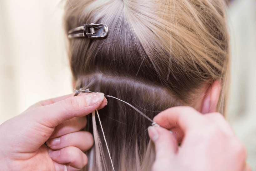 Close-up of bead placement for sewn in extensions